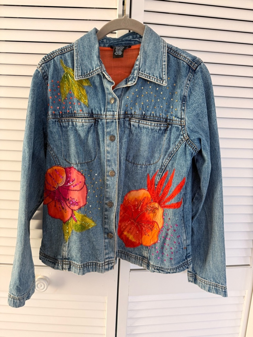 Hand-Painted Blue Denim Jacket with Orange Floral Accents